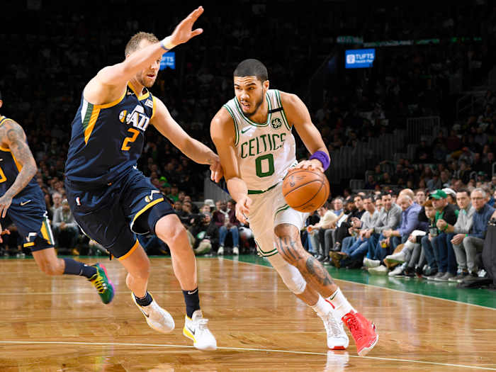 BOSTON, MA - MARCH 6: Jayson Tatum #0 of the Boston Celtics handles the ball against the Utah Jazz on March 6, 2020 at the TD Garden in Boston, Massachusetts.